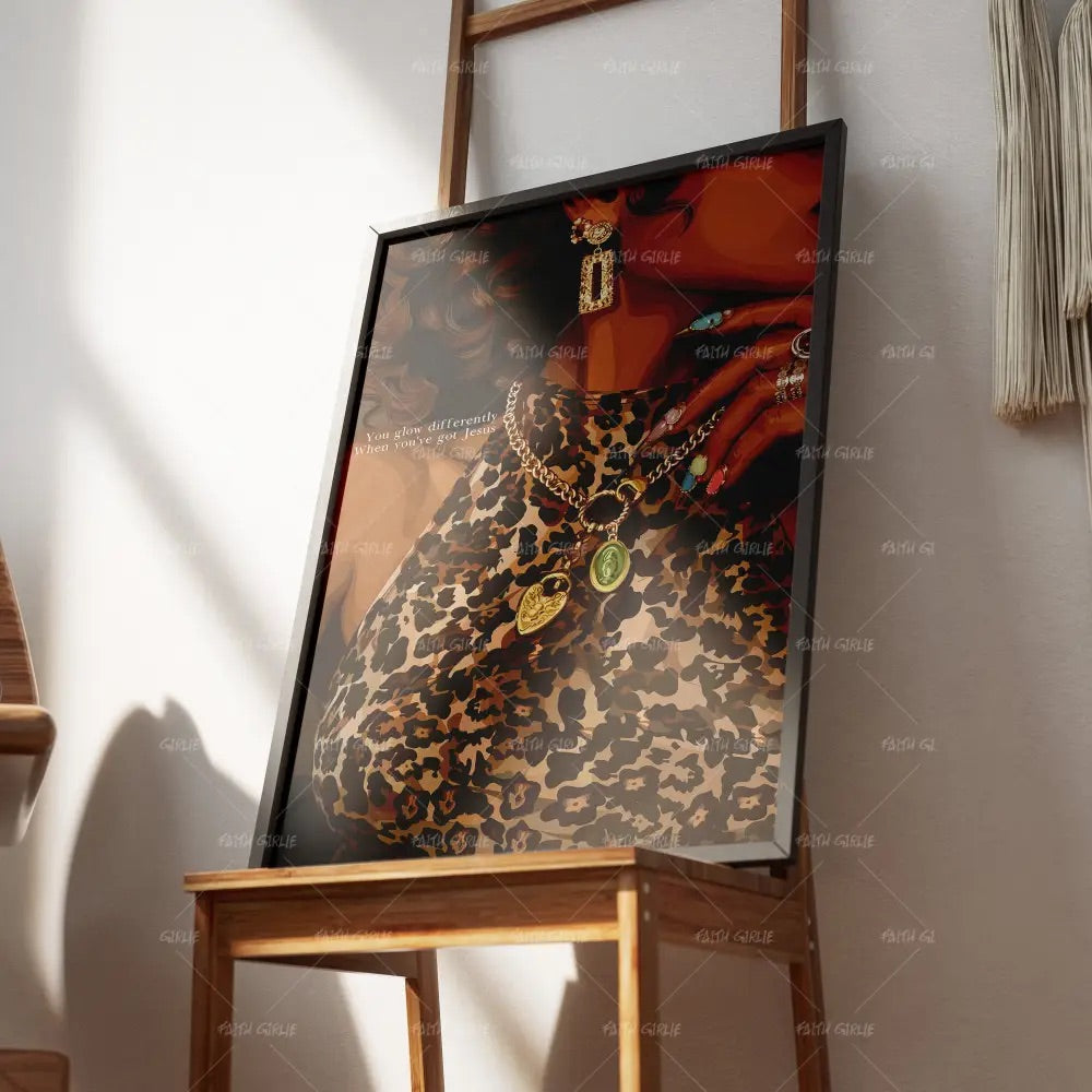 Glowdifferently Christian confidence wall art by Faith Girlie featuring a stylish woman in leopard print with gold jewelry and the message “You glow differently when you've got Jesus.”