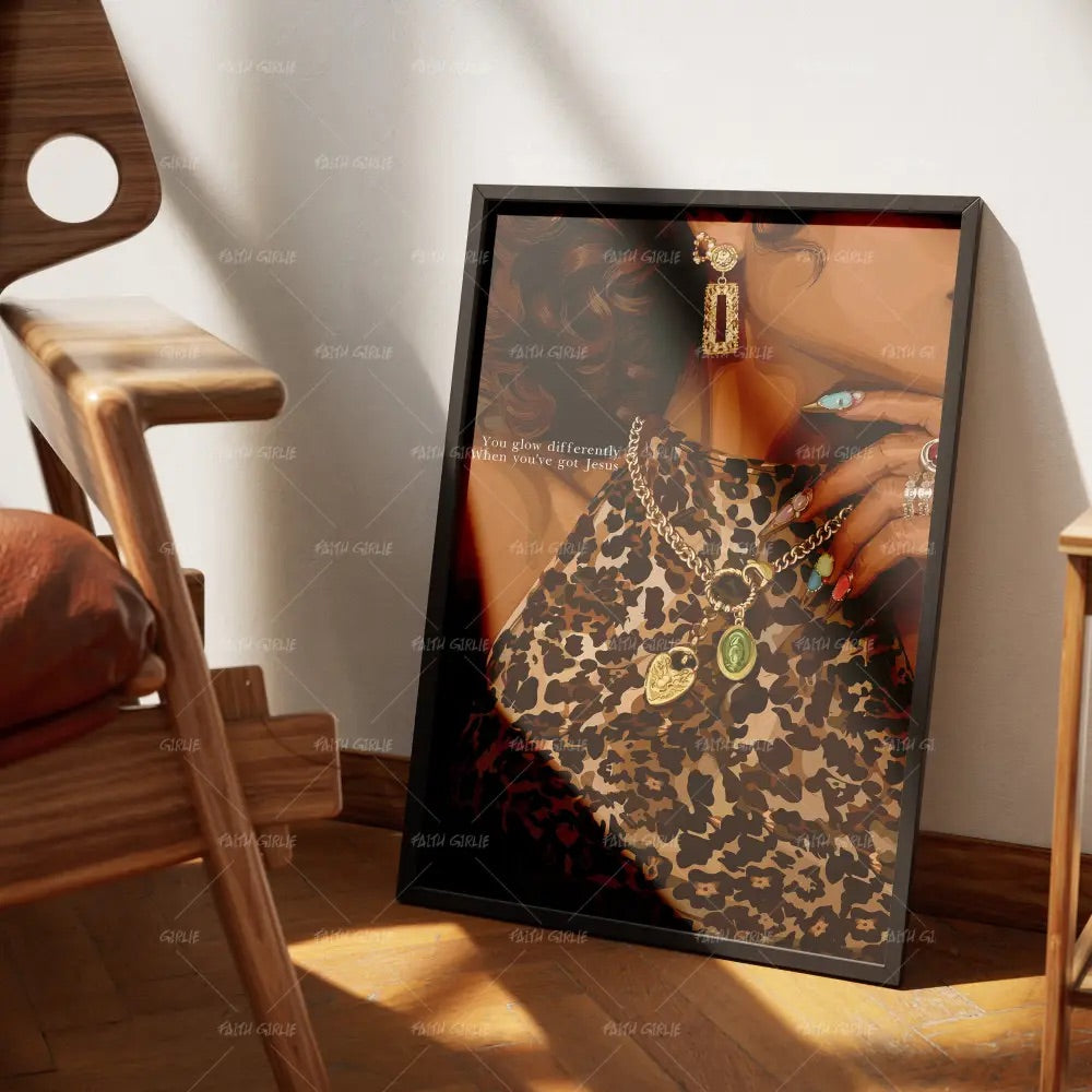 Glowdifferently Christian confidence wall art by Faith Girlie featuring a stylish woman in leopard print with gold jewelry and the message “You glow differently when you've got Jesus.”